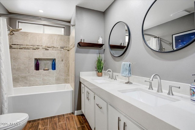 2846 E Lupine Ave, Phoenix, AZ 85028 - bathroom with a sink, wood finished floors, shower / tub combo with curtain, and toilet