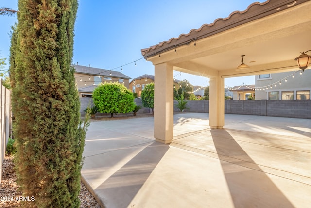 view of patio / terrace featuring ceiling fan