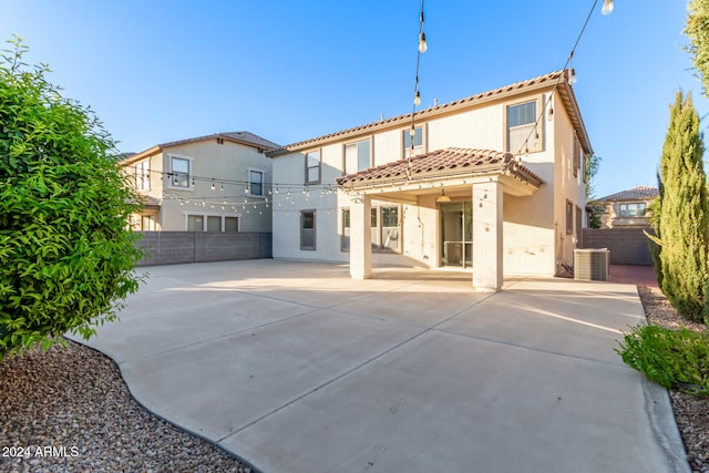 rear view of property with a patio area