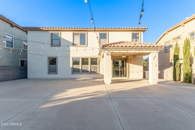 rear view of property with a patio area