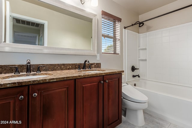 full bathroom featuring tile patterned flooring, vanity, toilet, and washtub / shower combination