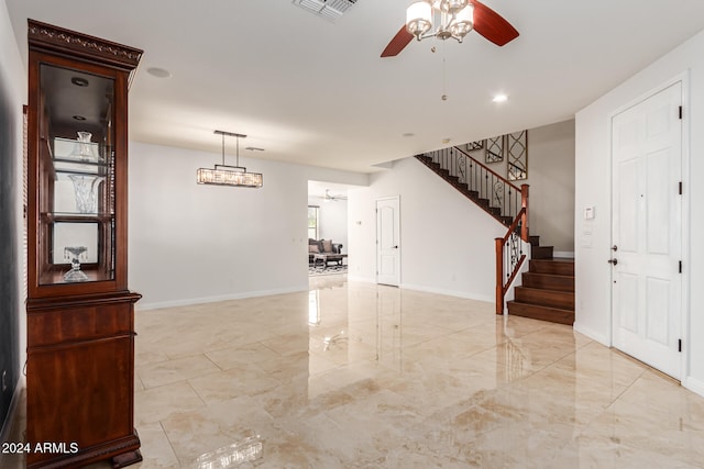 interior space featuring ceiling fan