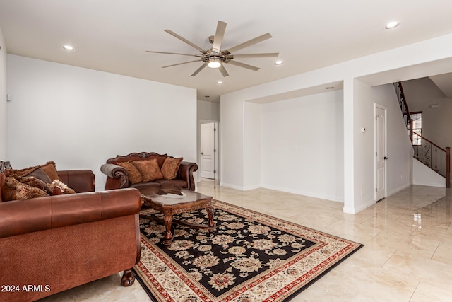 living room featuring ceiling fan