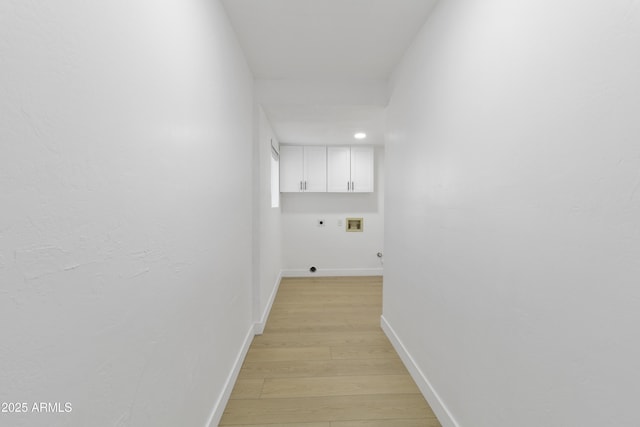 corridor featuring light hardwood / wood-style floors