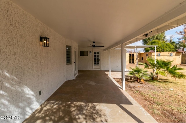 view of patio / terrace featuring ceiling fan