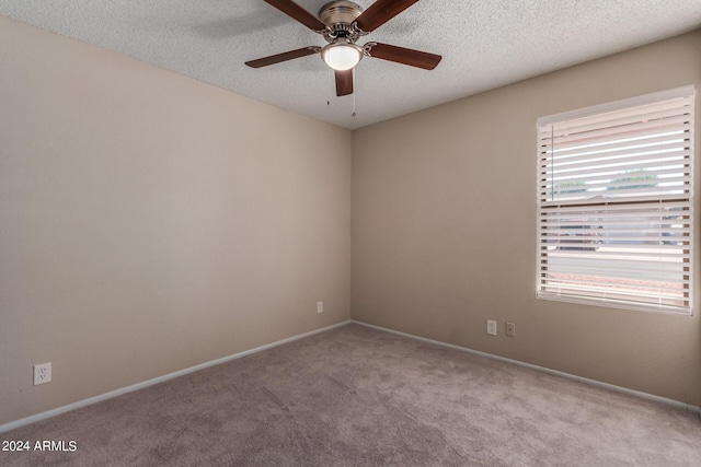 6034 E Hillview St, Mesa, AZ 85205 - carpeted spare room with a textured ceiling, baseboards, and ceiling fan