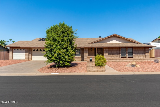 single story home featuring a garage