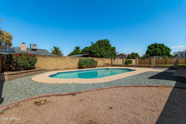 6034 E Hillview St, Mesa, AZ 85205 - view of swimming pool with a fenced in pool and a fenced backyard