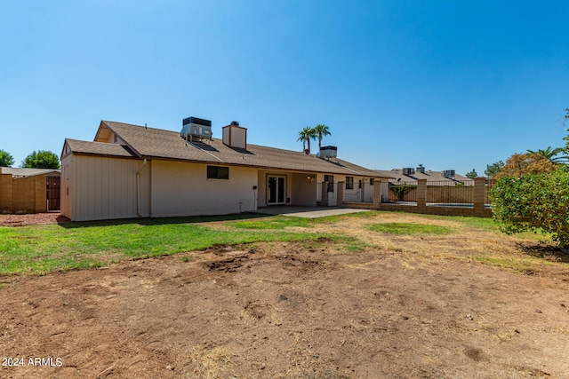 rear view of house with a patio area