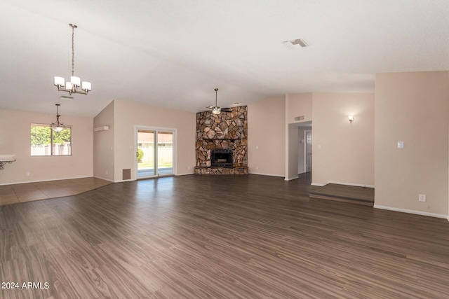 6034 E Hillview St, Mesa, AZ 85205 - unfurnished living room featuring visible vents, wood finished floors, a stone fireplace, lofted ceiling, and ceiling fan with notable chandelier