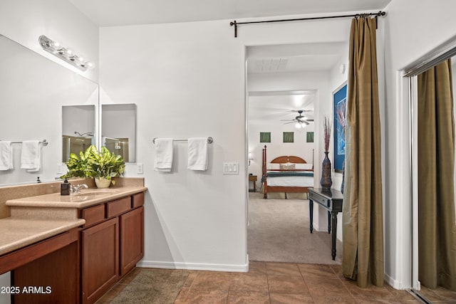 4221 S Fireside Ct, Gilbert, AZ 85297 - bathroom featuring ensuite bath, vanity, ceiling fan, and tile patterned floors