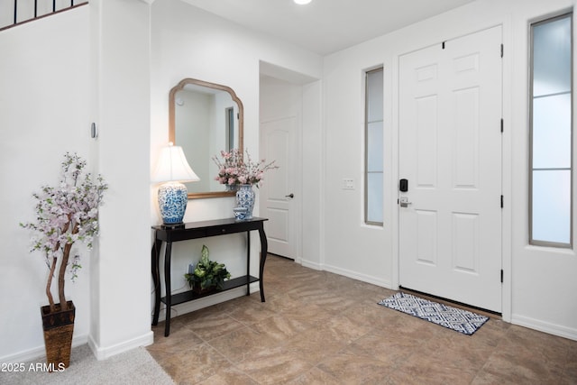 4221 S Fireside Ct, Gilbert, AZ 85297 - foyer featuring baseboards and arched walkways
