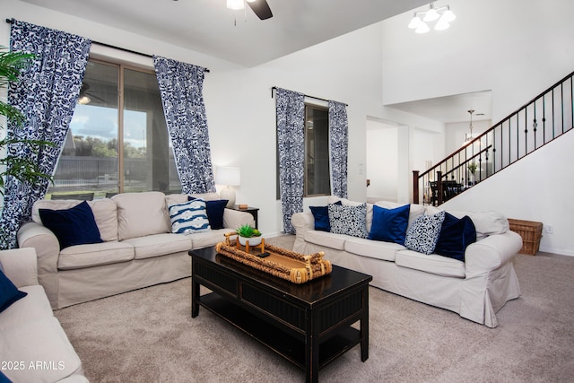 4221 S Fireside Ct, Gilbert, AZ 85297 - carpeted living room with stairway and a ceiling fan