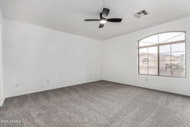 carpeted empty room with ceiling fan