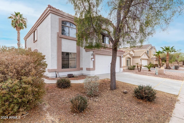 view of front of home with a garage