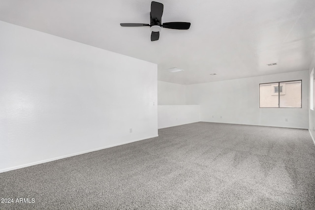 unfurnished room with carpet and ceiling fan