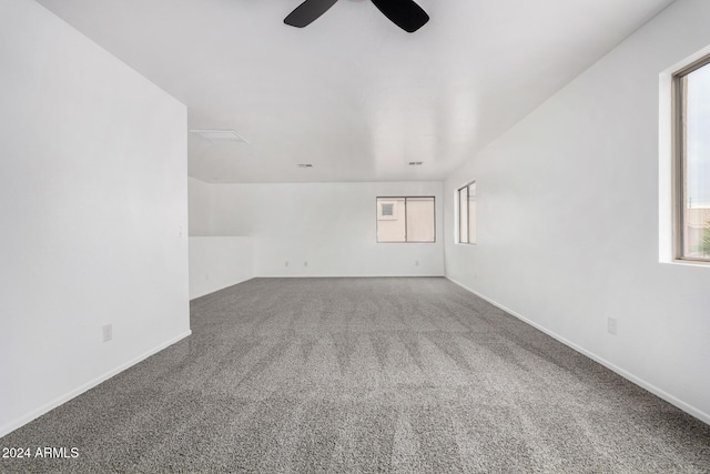 spare room with carpet flooring and ceiling fan