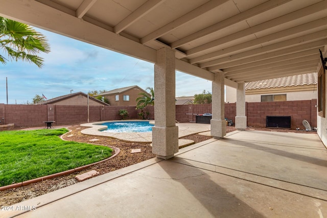 view of patio / terrace featuring a fenced in pool