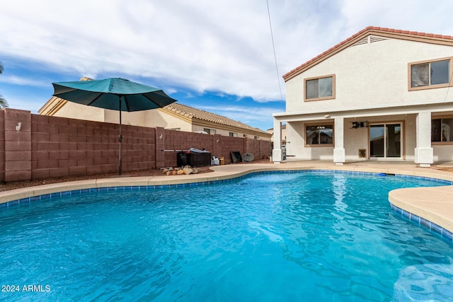 view of pool featuring a patio