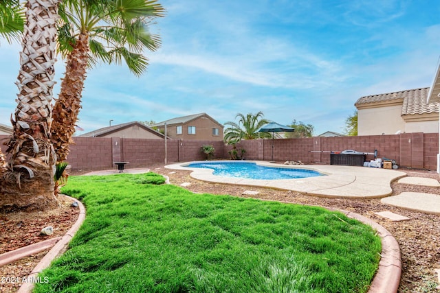 view of swimming pool featuring a patio area