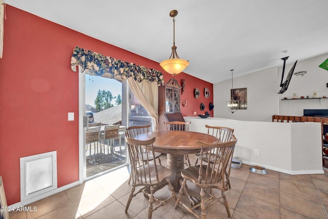 13051 N 75th Dr, Peoria, AZ 85381 - tiled dining space with vaulted ceiling and baseboards