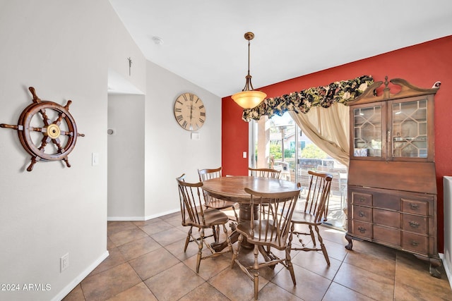 13051 N 75th Dr, Peoria, AZ 85381 - dining room with vaulted ceiling, tile patterned flooring, and baseboards