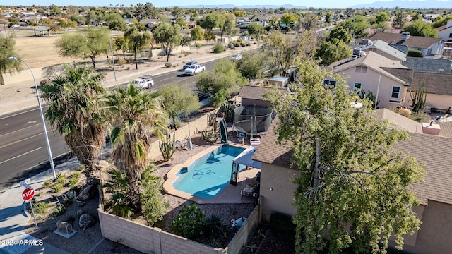13051 N 75th Dr, Peoria, AZ 85381 - aerial perspective of suburban area with a pool area and a mountain backdrop