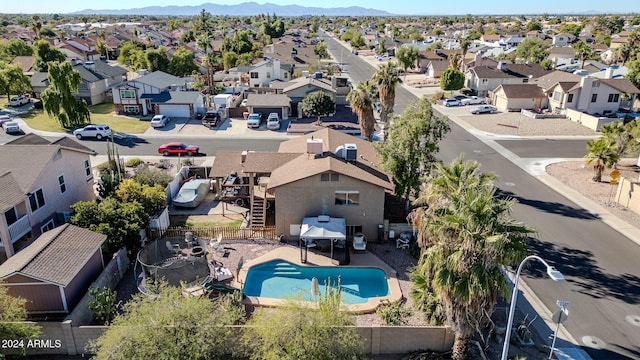 13051 N 75th Dr, Peoria, AZ 85381 - aerial view of residential area featuring a mountainous background and a pool area