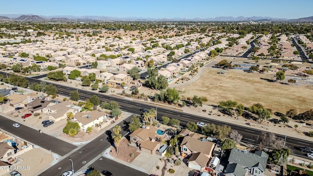 13051 N 75th Dr, Peoria, AZ 85381 - aerial view of property and surrounding area featuring a mountainous background and nearby suburban area