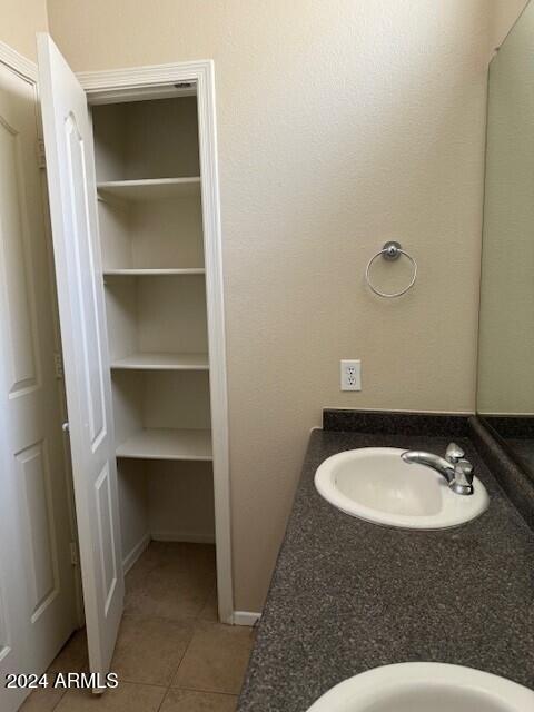 bathroom featuring vanity and tile patterned floors