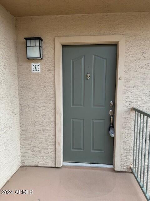 doorway to property with a balcony