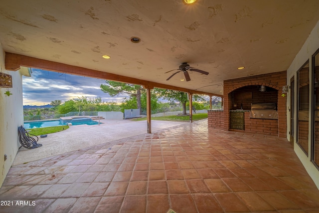 view of patio / terrace featuring area for grilling, grilling area, and ceiling fan