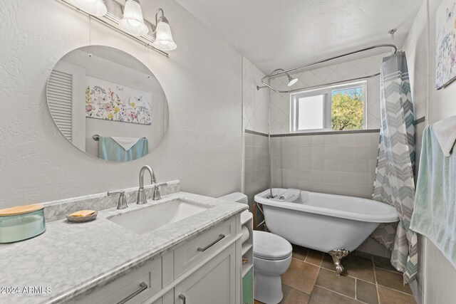 full bathroom with vanity, toilet, separate shower and tub, and tile patterned flooring