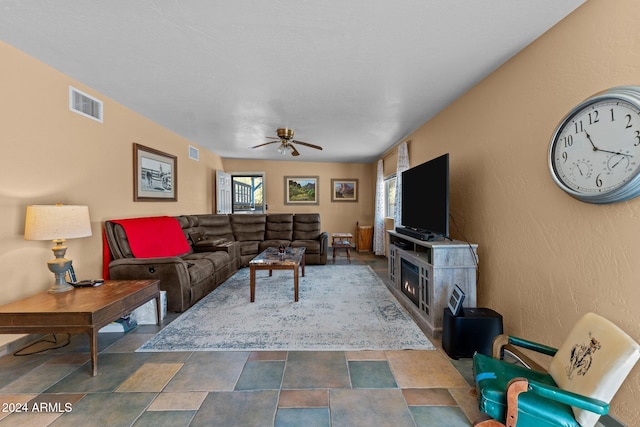 living room featuring ceiling fan