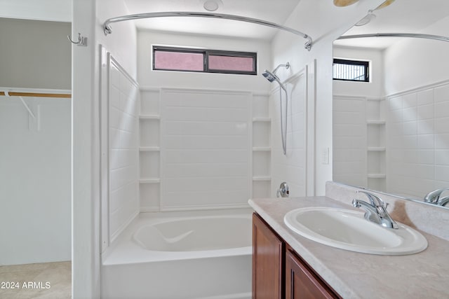 bathroom with bathtub / shower combination and vanity