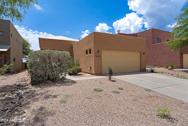 adobe home with a garage