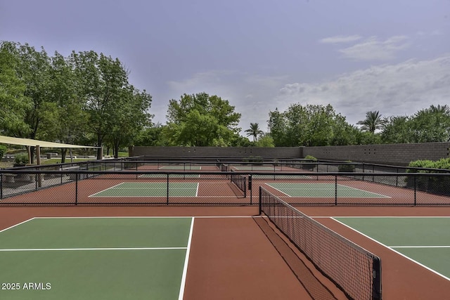 view of sport court featuring community basketball court and fence