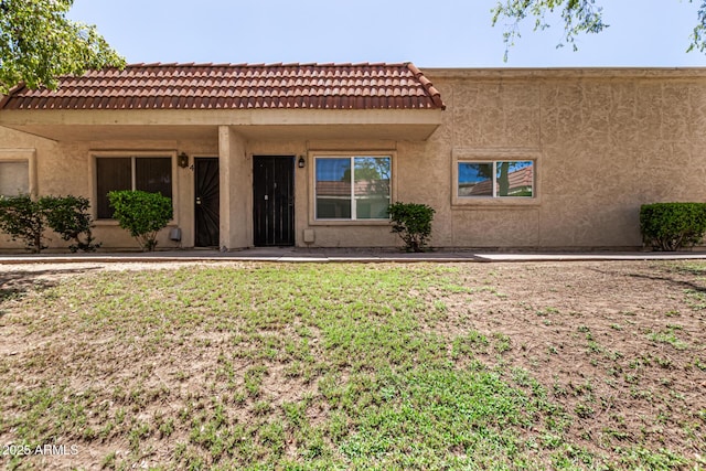 17228 N 16th Dr Unit 3, Phoenix, AZ 85023 - view of front facade featuring a front yard and stucco siding