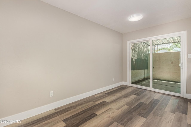 17228 N 16th Dr Unit 3, Phoenix, AZ 85023 - empty room with baseboards and wood finished floors