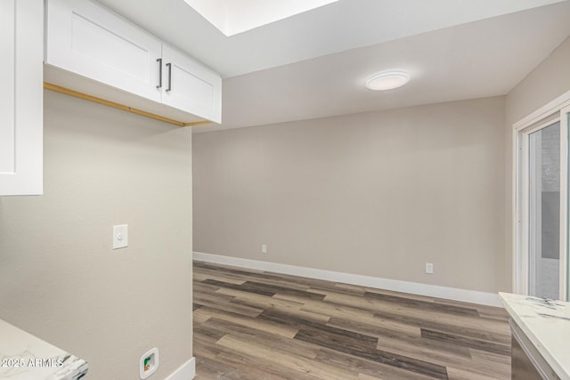 17228 N 16th Dr Unit 3, Phoenix, AZ 85023 - kitchen with dark wood-style flooring, white cabinets, and light countertops