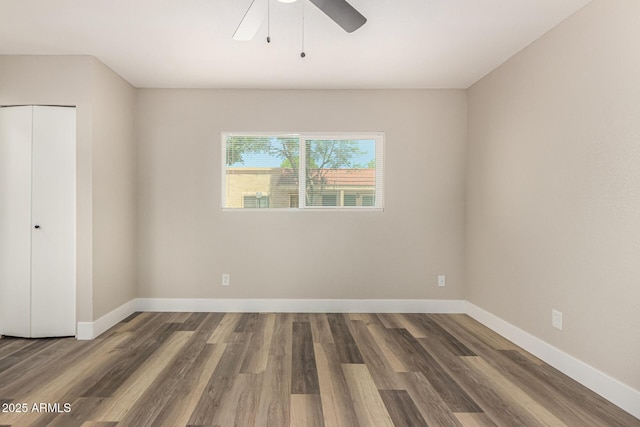 17228 N 16th Dr Unit 3, Phoenix, AZ 85023 - unfurnished bedroom featuring wood finished floors, a closet, and a ceiling fan