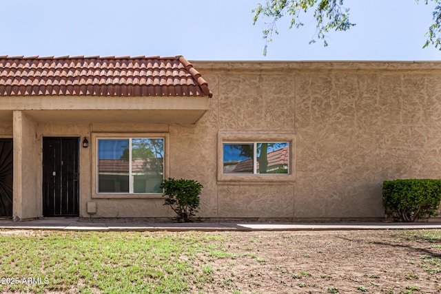 17228 N 16th Dr Unit 3, Phoenix, AZ 85023 - view of front facade featuring stucco siding and a tile roof