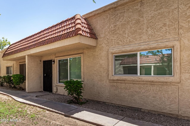 17228 N 16th Dr Unit 3, Phoenix, AZ 85023 - view of front of house featuring stucco siding and a tile roof