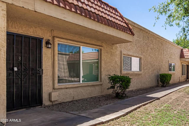 17228 N 16th Dr Unit 3, Phoenix, AZ 85023 - entrance to property with a tiled roof and stucco siding
