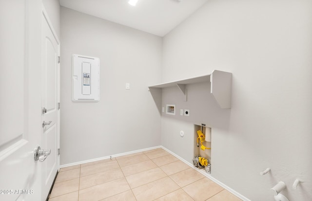 26949 W Lone Cactus Dr, Buckeye, AZ 85396 - washroom with hookup for a gas dryer, electric dryer hookup, light tile patterned floors, hookup for a washing machine, and baseboards