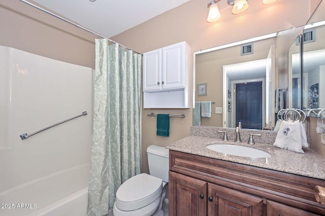 full bathroom with toilet, vanity, and shower / bath combo