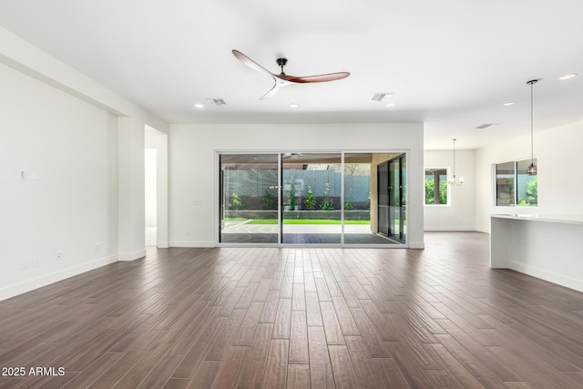 unfurnished living room featuring a ceiling fan, visible vents, recessed lighting, and dark wood-style flooring