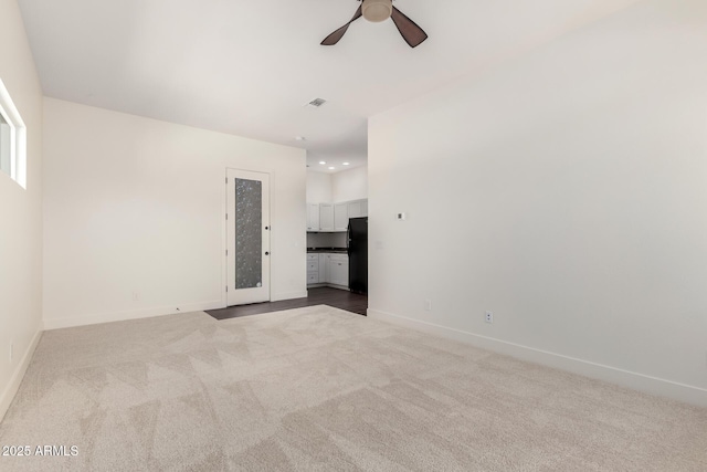spare room featuring visible vents, baseboards, recessed lighting, a ceiling fan, and carpet floors