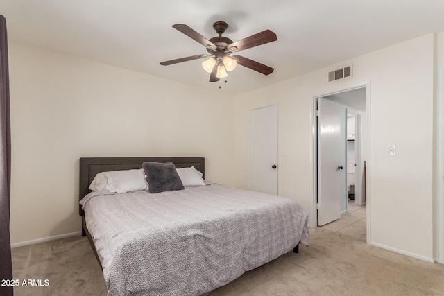 bedroom featuring visible vents, ceiling fan, light carpet, and baseboards