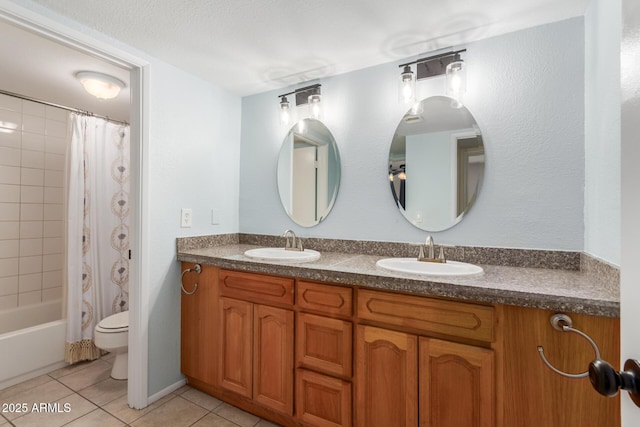 bathroom with toilet, tile patterned flooring, shower / bath combo, and a sink